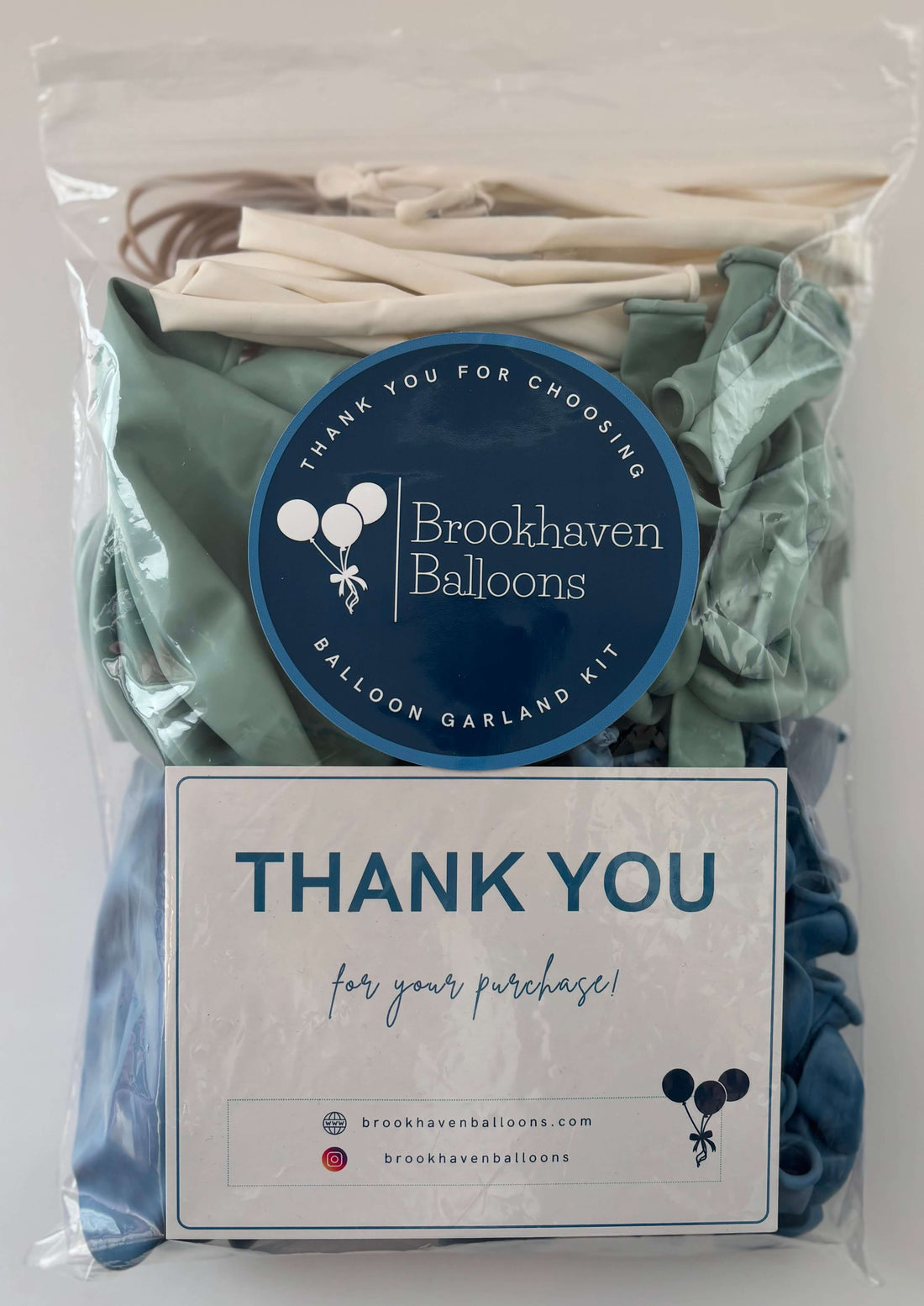 Balloon garland kit by Brookhaven Balloons featuring various colors and a thank you note for your purchase.