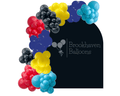 Colorful balloon garland by Brookhaven Balloons, featuring red, blue, yellow, and black balloons for event decor.